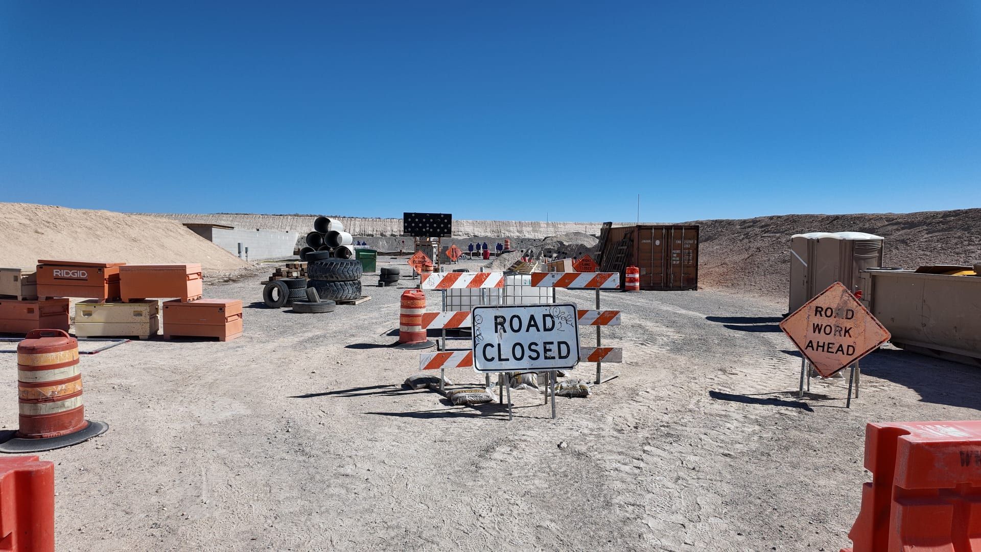 Road closed signs, barrels and barricades across the Construction Zone course at Staccato Ranch Vegas.